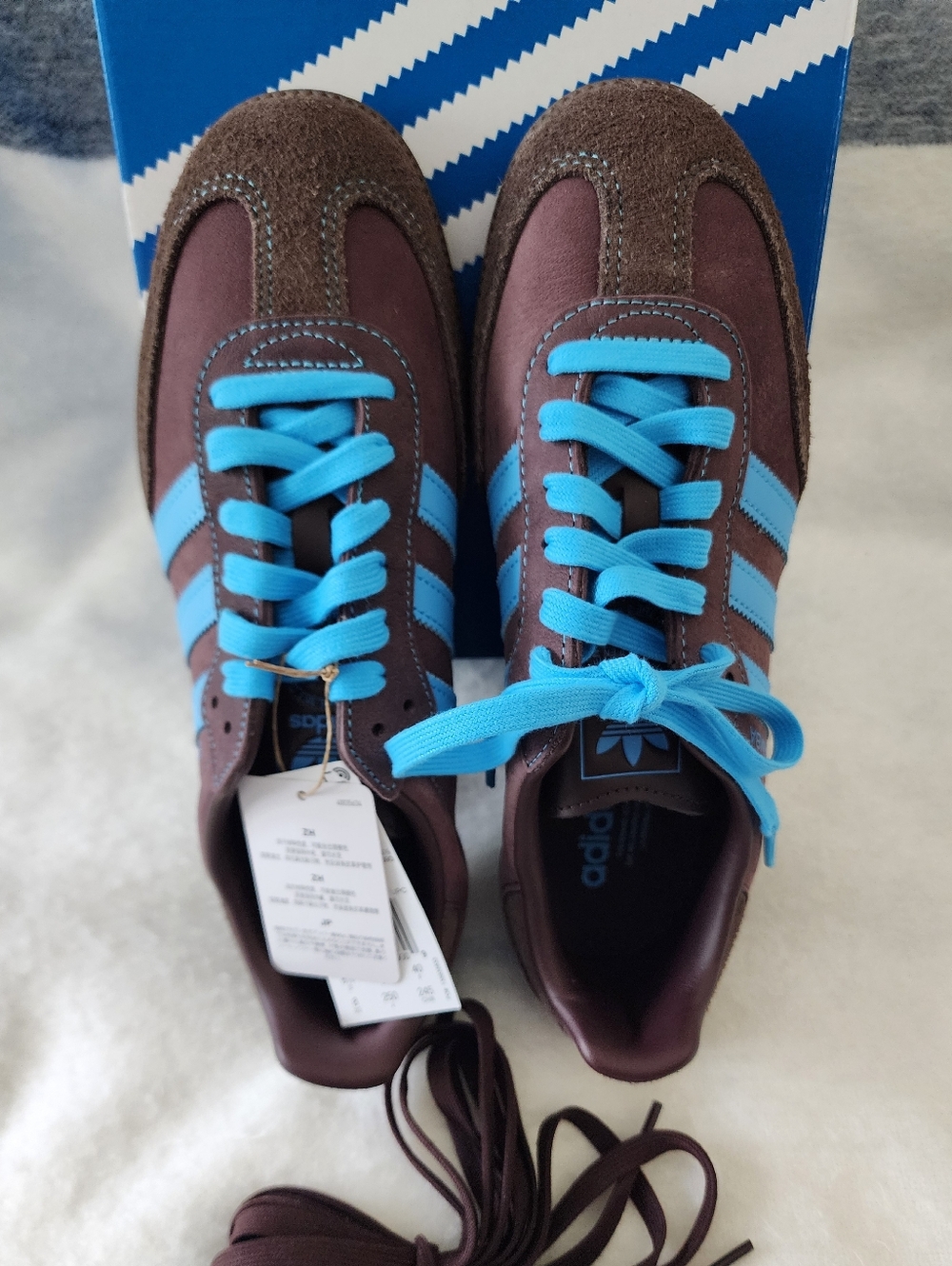 adidas Brown Suede Sneakers with Bright Blue Stripes and Laces
